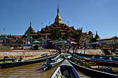 Inle Lake Myanmar. Phaung Daw Oo Paya. Enshrined in the pagoda are five small ancient Buddha images that have been transformed into amorphous blobs by the sheer volume of gold leaf applied by devotees.  